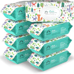 Stack of baby wipes packages with colorful designs on a white background