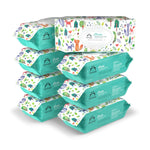 Stack of baby wipes packages with colorful animal patterns on a white background