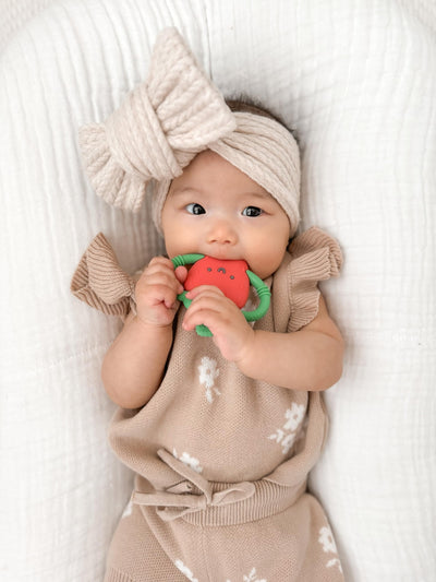 Itzy Ritzy Strawberry-Shaped Baby Teether with Handles – Silicone Teether for Babies with Easy-Grab Handles and Textured, Teethable Surfaces – Baby Teething Toy for 3 Months & Up (Strawberry)