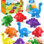 Colorful dinosaur toys with letter labels next to their packaging