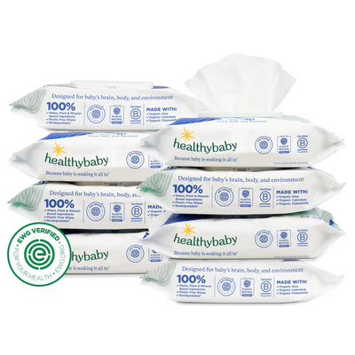 Multiple packages of healthybaby wipes stacked on a white background