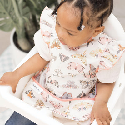 Tiny Twinkle Mess Proof Baby Bib - Waterproof Baby Apron - Machine Washable - PVC, BPA, & Phthalate Free - Great Travel Bib for Baby Eating - Baby Food Bibs (Flutter,Large 2-4 Years)