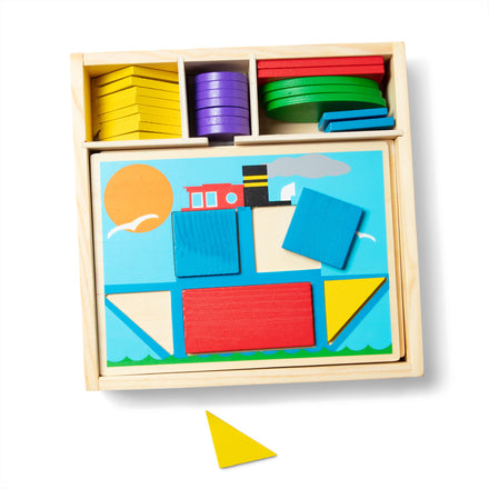 Colorful wooden puzzle with geometric shapes and a boat design on a white background
