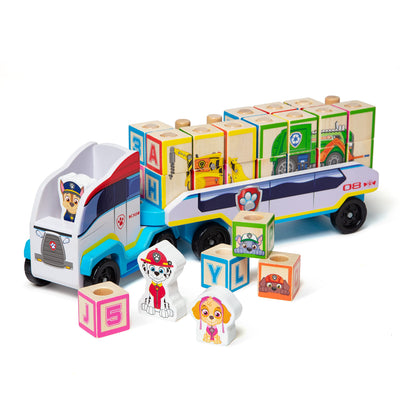 Toy truck with character blocks and alphabet blocks on a white background