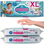 Packaging of oversized unscented baby wipes with a hand pulling out a wipe.