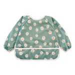 Children's bib with floral pattern on a white background