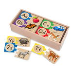 Wooden alphabet puzzle set with animals and letters on a white background