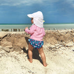 green sprouts Girls' Snap Reusable Absorbent Swimsuit Diaper, Navy Flamingos, 18 M