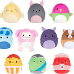 Collection of colorful plush toys with animal faces on a white background
