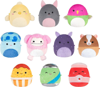 Collection of colorful plush toys with animal faces on a white background