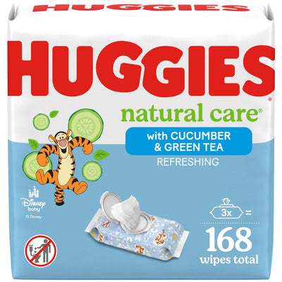 Huggies natural care wipes packaging with cartoon character and product details.
