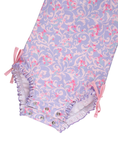 RuffleButts Baby Girls UPF 50+ Sun Protection Floral Printed Long Sleeve One Piece Rash Guard Swimsuit with Zipper - Lavender Floral Princess, 3-6 Months