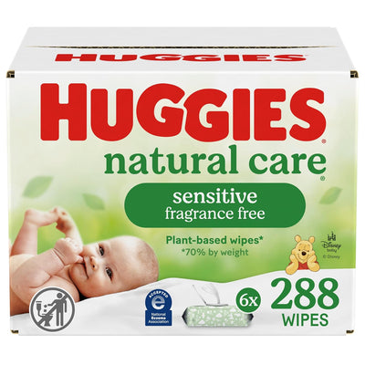 Huggies natural care sensitive fragrance free wipes packaging with a baby and Winnie the Pooh on a white background.