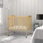 Delta Children Folding Portable Mini Baby Crib with 1.5-inch Mattress - Greenguard Gold Certified, Natural