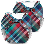 Two colorful plaid-patterned baby diapers on a white background