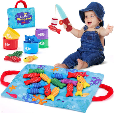 Child playing with a fishing toy set on a colorful mat