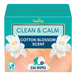 Pampers wipes box with cotton blossoms and 'Clean & Calm' text on a teal background