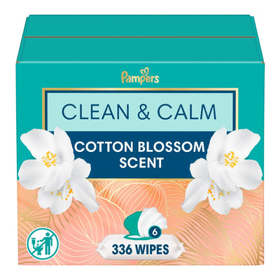 Pampers wipes box with cotton blossoms and 'Clean & Calm' text on a teal background