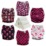 Collection of patterned cloth diapers and white washcloths on a white background