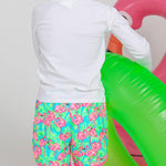 RUGGEDBUTTS Boys UPF50+ Sun Protection Dolphin Hem Swim Trunks - Neon Flamingo Fun, 18-24m