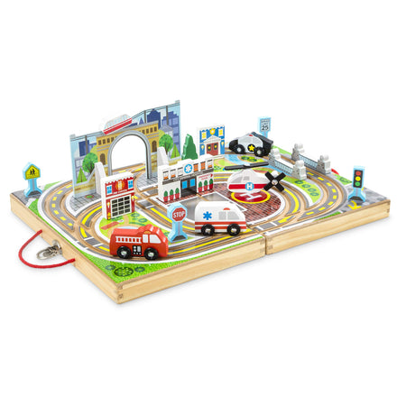 Wooden toy city set with roads, buildings, and toy vehicles on a white background