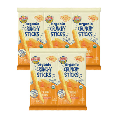 Three packages of Organic Crunchy Sticks with cheddar cheese flavor on a white background