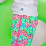 RUGGEDBUTTS Boys UPF50+ Sun Protection Dolphin Hem Swim Trunks - Neon Flamingo Fun, 18-24m