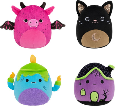 Four colorful plush toys with Halloween-themed designs on a white background