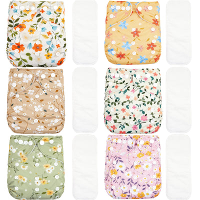 Set of six floral-patterned cloth diapers on a white background