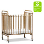 Namesake Abigail 3-in-1 Portable Baby Crib with Wheels - GREENGUARD Gold Certified Convertible Crib to Toddler Bed & Daybed - Metal Baby Bed w/ 4 Adjustable Mattress Heights, for Small Spaces - Gold