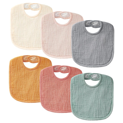 Set of six colorful baby bibs on a white background