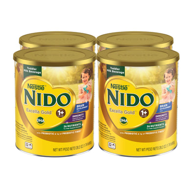 Four cans of Nestle Nido Excella Gold toddler milk beverage on a white background