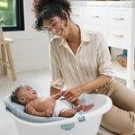 Skip Hop Baby Bath Tub 4-in-1 Grow with Baby Infant to Toddler Bathtub with Supportive Sling and Sit-Up Support Wave Age 0m+