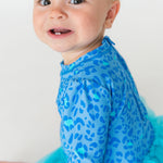 RuffleButts Baby Girls UPF 50+ Sun Protection Tulle Skirted Long Sleeve One Piece Rash Guard Swimsuit - by The Seaside, 12-18m