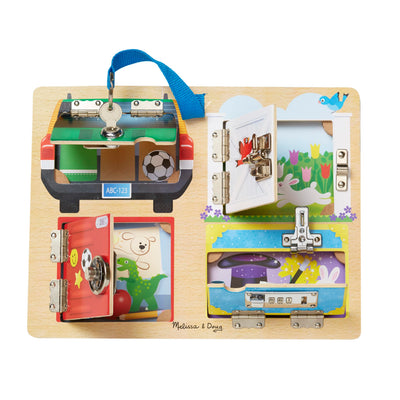 Wooden toy with multiple hinged doors featuring different scenes and objects.