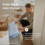 Stokke Flexi Bath Bundle, Sandy Beige - Foldable Baby Bathtub + Newborn Support - Durable & Easy to Store - Convenient to Use at Home or Traveling - Best for Newborns & Babies Up to 48 Months