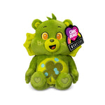 Green plush bear with a heart and clover design, wearing a 'Care Bears x Monstars' tag.