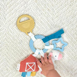 Itzy Ritzy Farm Toy Gift Set - Includes Cow Lovey & Farm-Themed Busy Ring Car Seat and Stroller Toy - Features Crinkle Sounds, Engaging Textures & Silicone Teething Relief (Farm)