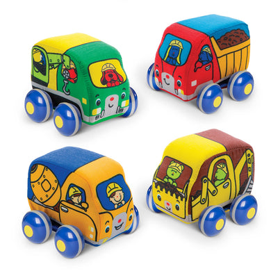 Set of colorful toy construction vehicles on a white background