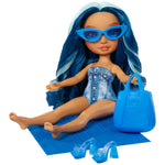 Rainbow High Swim & Style Skyler, Blue 11" Fashion Doll with Shimmery Wrap to Style 10+ Ways, Removable Swimsuit, Sandals, Fun Play Accessories, Great Toy Gift for Girls Kids Ages 4-12 Years