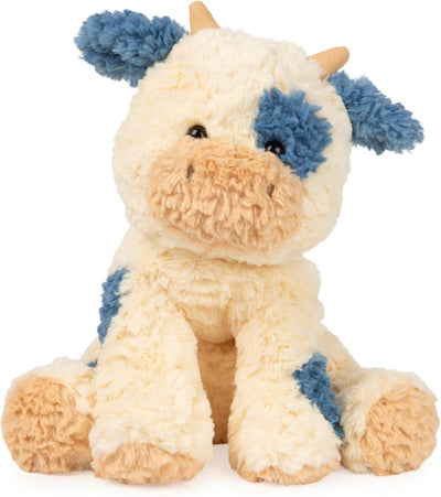 Plush toy cow with blue accents on a white background
