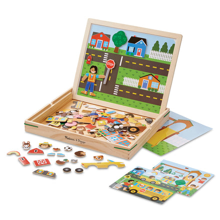 Wooden puzzle set with magnetic pieces and a scene on a white background