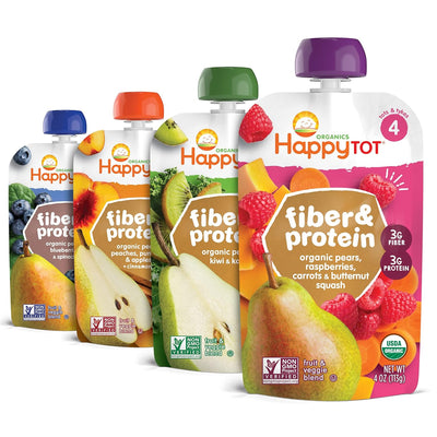 Assorted Happy Tot organic baby food pouches on a white background
