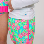 RUGGEDBUTTS Boys UPF50+ Sun Protection Dolphin Hem Swim Trunks - Neon Flamingo Fun, 18-24m