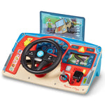Children's toy steering wheel and dashboard set with screen displaying educational content, brand 'Melissa & Doug' visible.