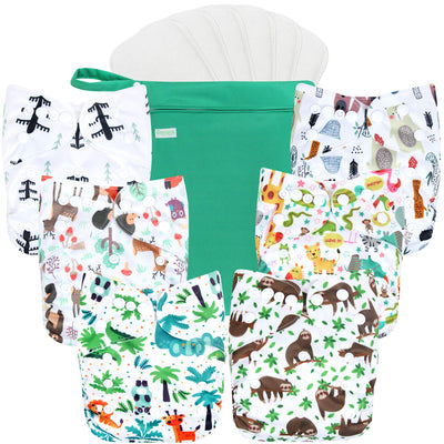 Set of baby diapers with animal prints and a green bag on a white background