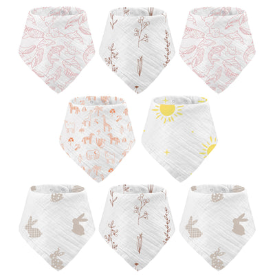 Set of baby bibs with various patterns on a white background