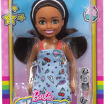 Barbie Chelsea Doll, Small Doll Wearing Removable Blue Dress with Colorful Print & Pink Shoes, Brown Hair & Green Eyes