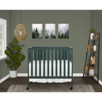 Dream On Me Jett Mini Folding Baby Crib in Olive, GreenGuard Gold & BSA, Lightweight & Portable, Patented Flat Folding System for Small Spaces & Travel, 1.5” Mattress Pad, 3 Heights, Safe Wheels