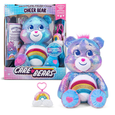 Colorful Care Bear toy with packaging and accessories on a white background